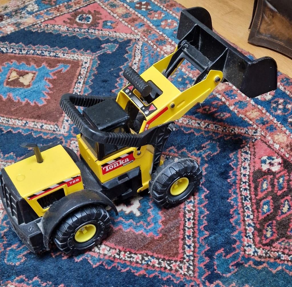 Speelgoed buldozer, Ophalen
