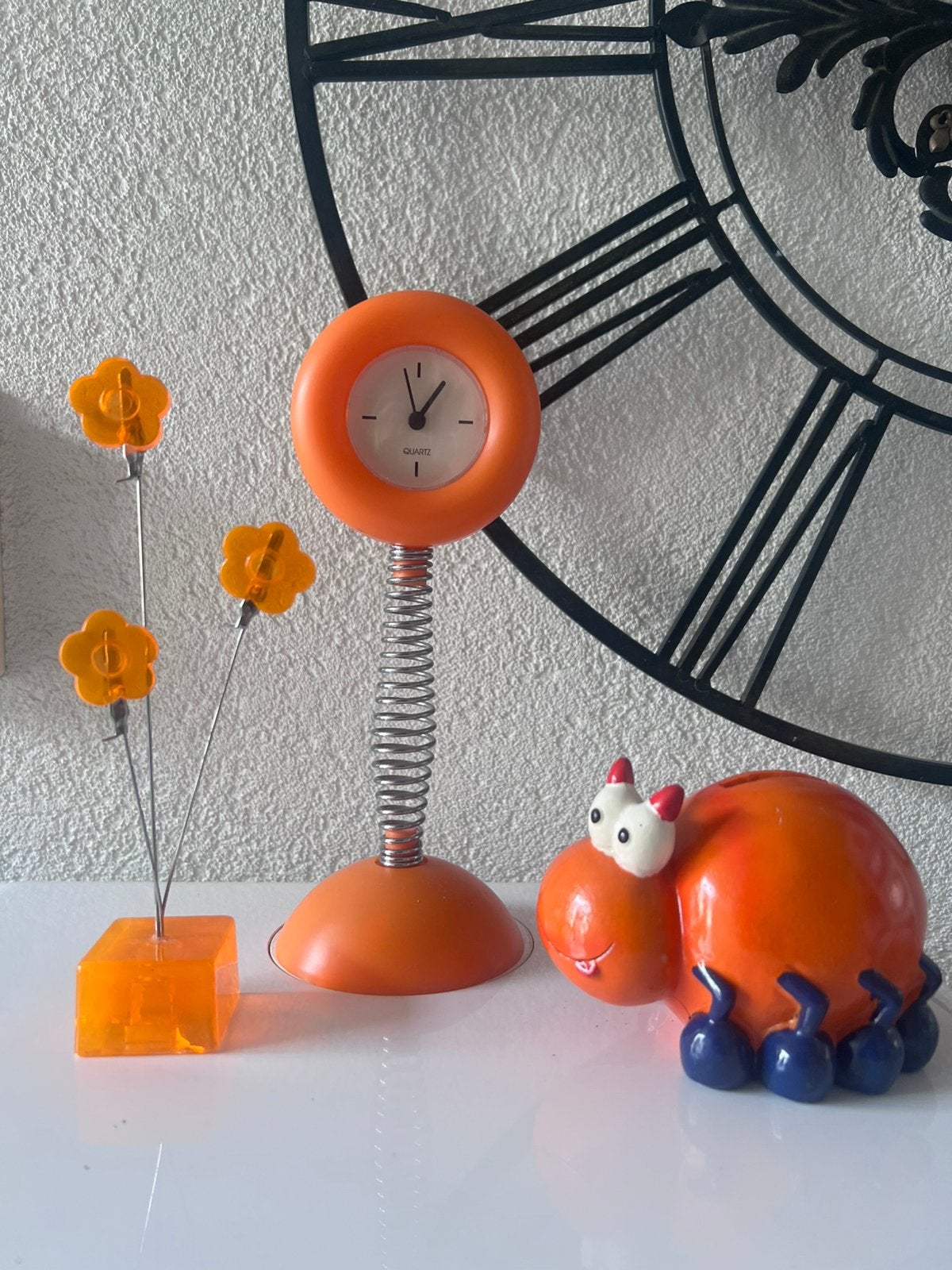 Oranje tafelklokje op veer - Spaarpotje - Fotohouder, Ophalen of Verzenden, Zo goed als nieuw