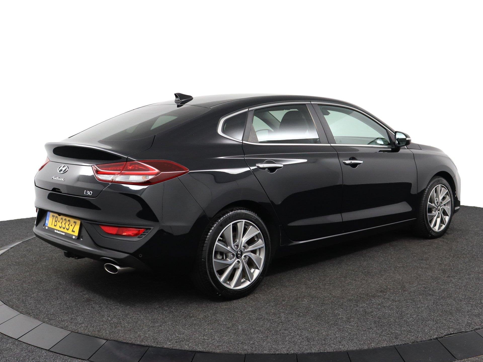 Hyundai i30 Fastback 1.0 T-GDI Premium, Auto's, Voorwielaandrijving, 12 maanden, Gebruikt, Euro 6