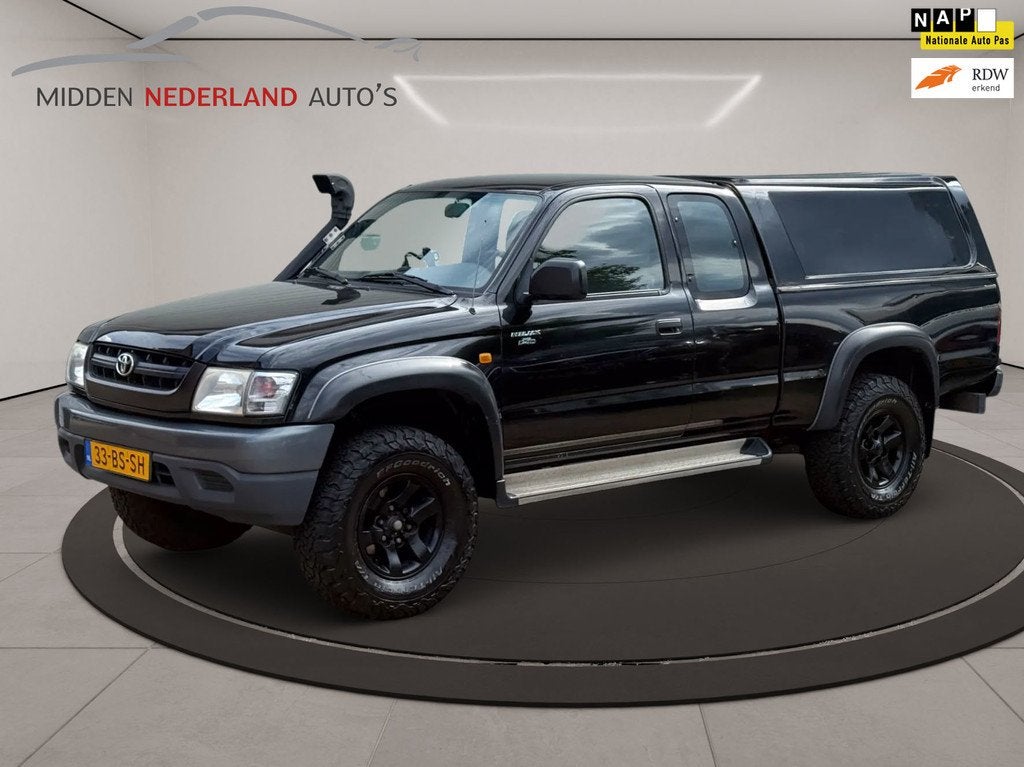 Toyota HiLux 2.5 D4-D 100 Xtra * AIRCO * MARGE * TREKHAAK *, Auto's, Stof, Gebruikt, Zwart, Zwart