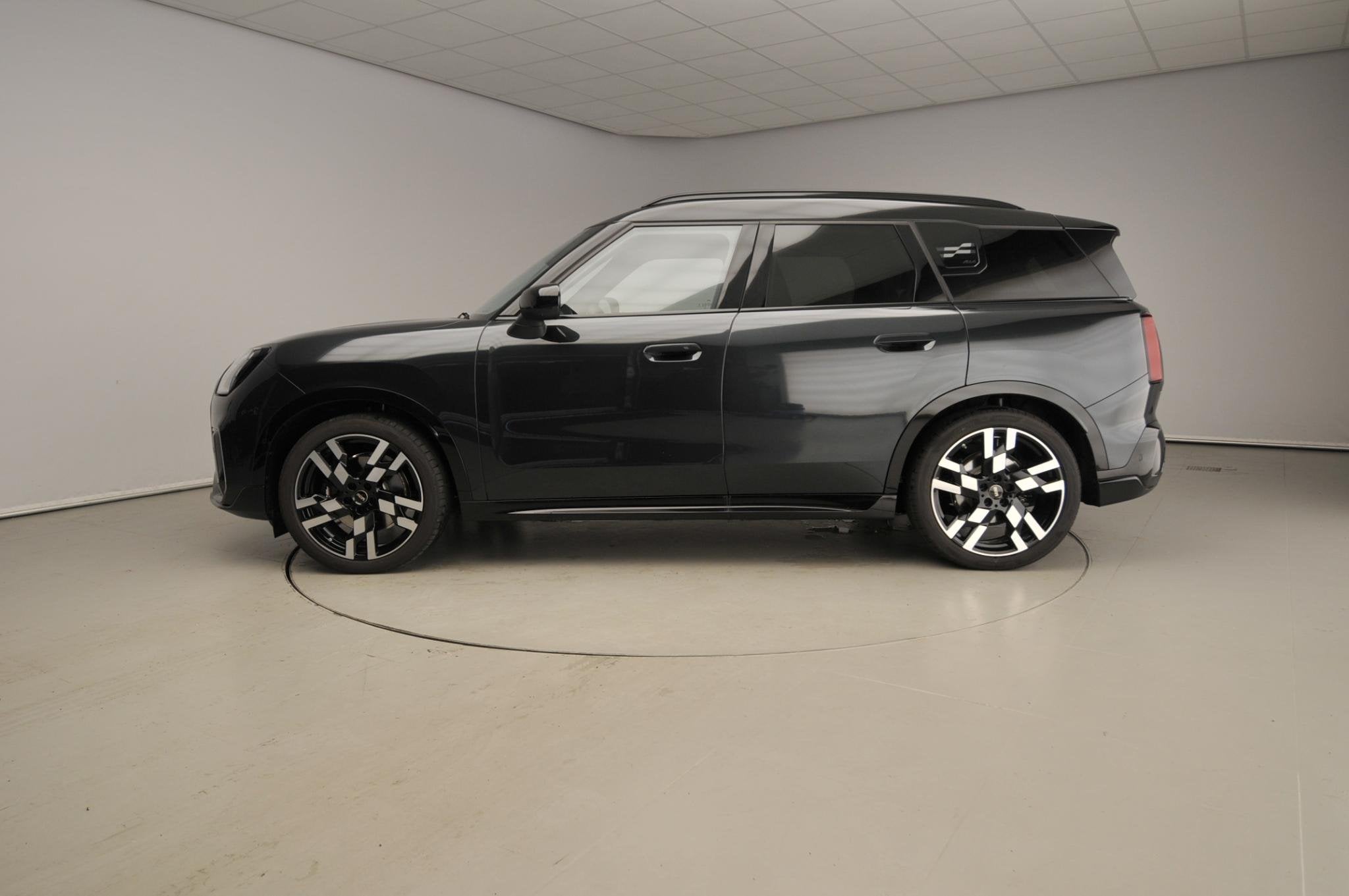 MINI Countryman SE ALL4 John Cooper Works XL 66.5 kWh Elektr, Auto's, Mini, Stof, 467 km, Zwart, Countryman