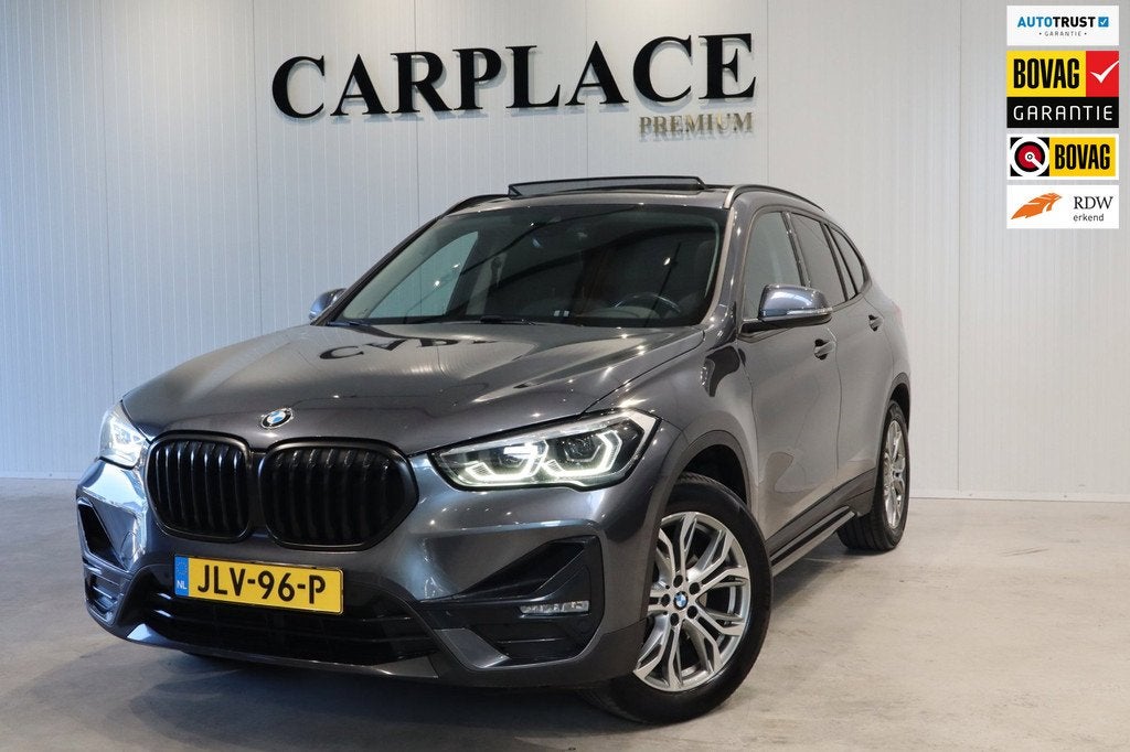BMW X1 SDrive18i High Executive-Panoramadak-Automaat, 136 pk, Gebruikt, Euro 6, Leder en Stof