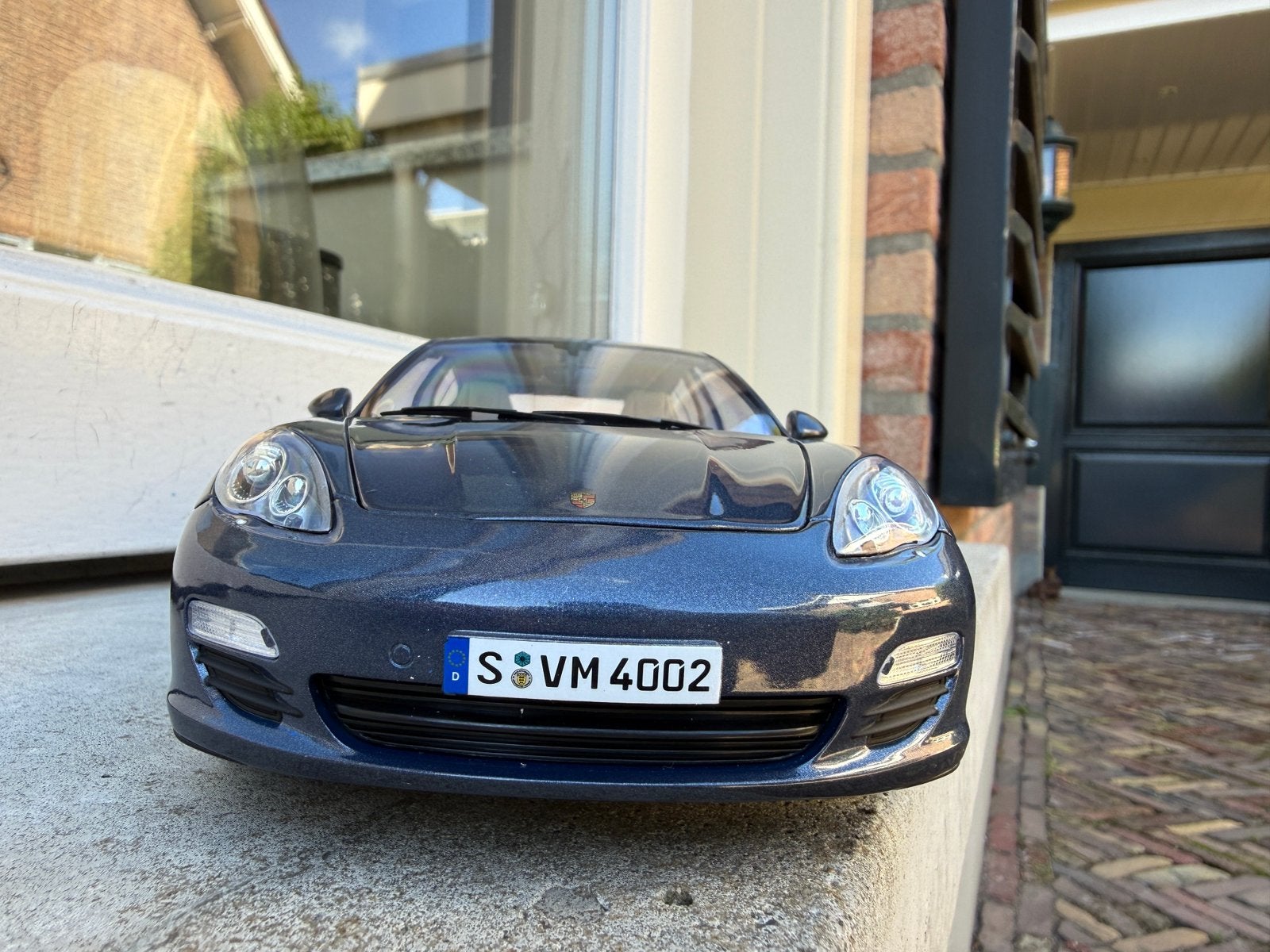 1:18 Porsche Panamera 4S Yachting Blue 2009 Norev Dealer, Auto, Norev, Norev, Zo goed als nieuw