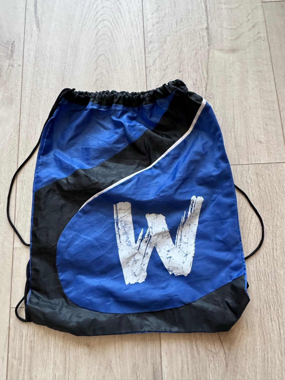 Blauwe sporttas met trekkoord en 'W' logo, Ophalen of Verzenden, Zo goed als nieuw, Jongens