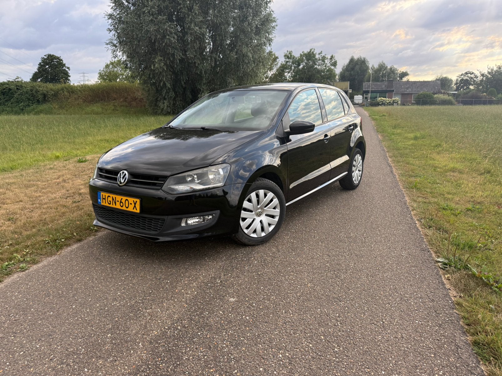 Volkswagen Polo 1.2 51KW 2009 Zwart carplay nw apk!!, Voorwielaandrijving, 967 kg, 1198 cc, Zwart