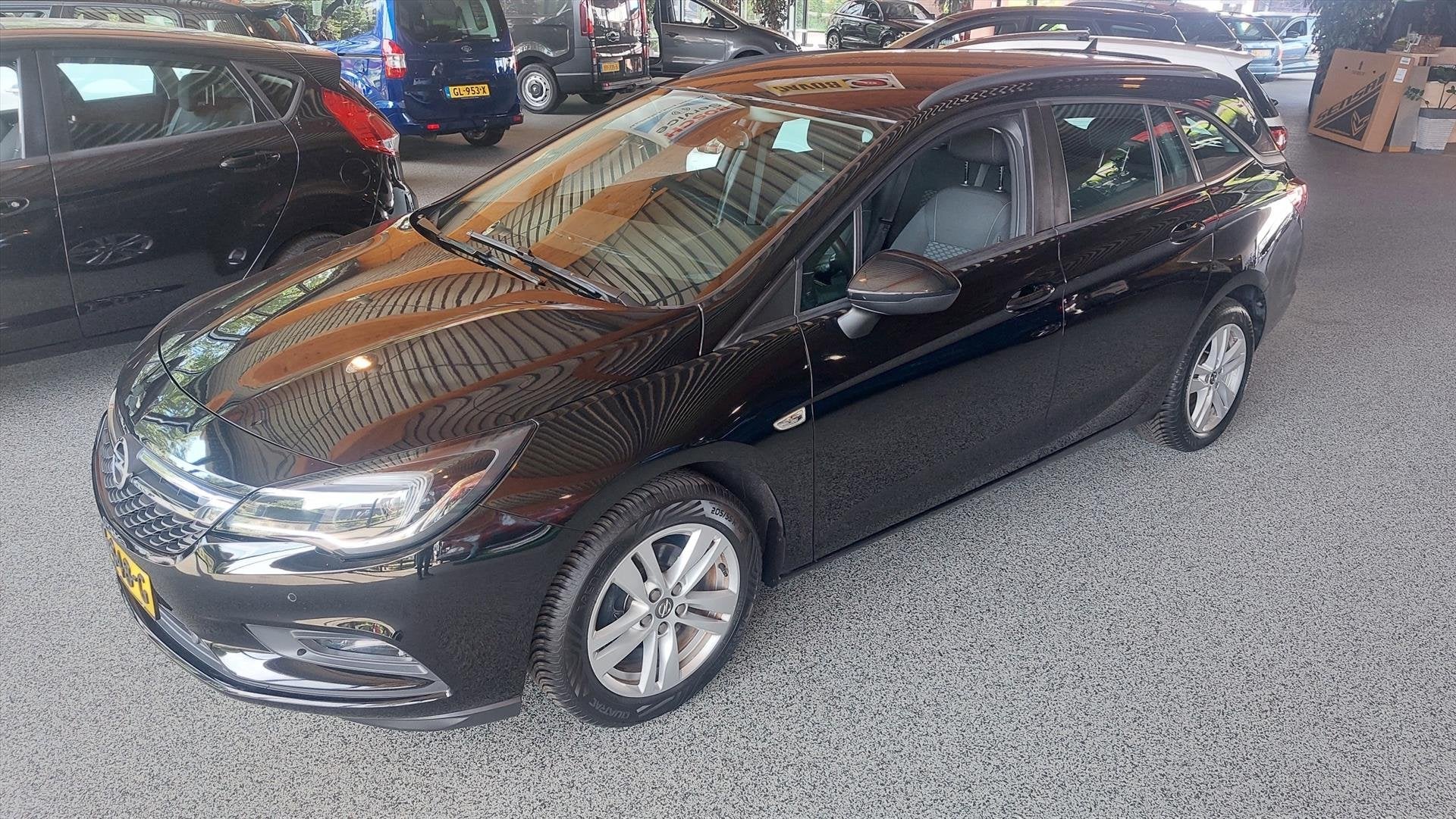 Opel Astra 1.0 TURBO 105 PK SPORTS TOURER, Auto's, Voorwielaandrijving, Gebruikt, Euro 6, 1178 kg