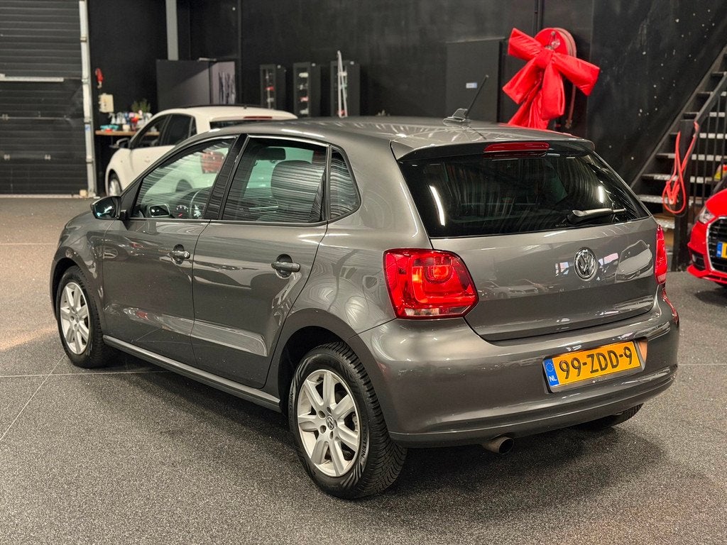 Volkswagen Polo 1.2 TSI Highline 2E-EIG/AIRCO/NAVI/CRUISE/BT, Voorwielaandrijving, Euro 5, Stof, Beige