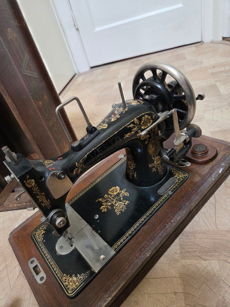 Vesla naaimachine, Ophalen