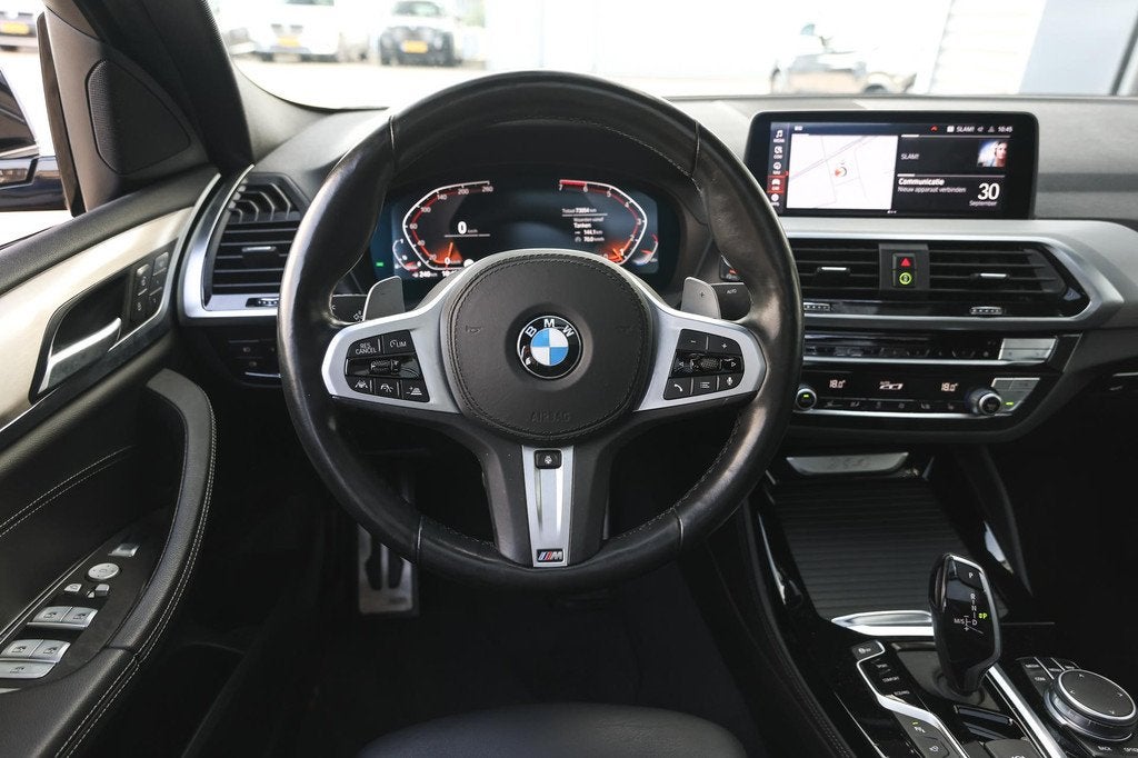 BMW X4 xDrive20i High Executive M Sport Automaat / Panoramad, Auto's, BMW, 15 km/l, Gebruikt, 4 cilinders, Blauw