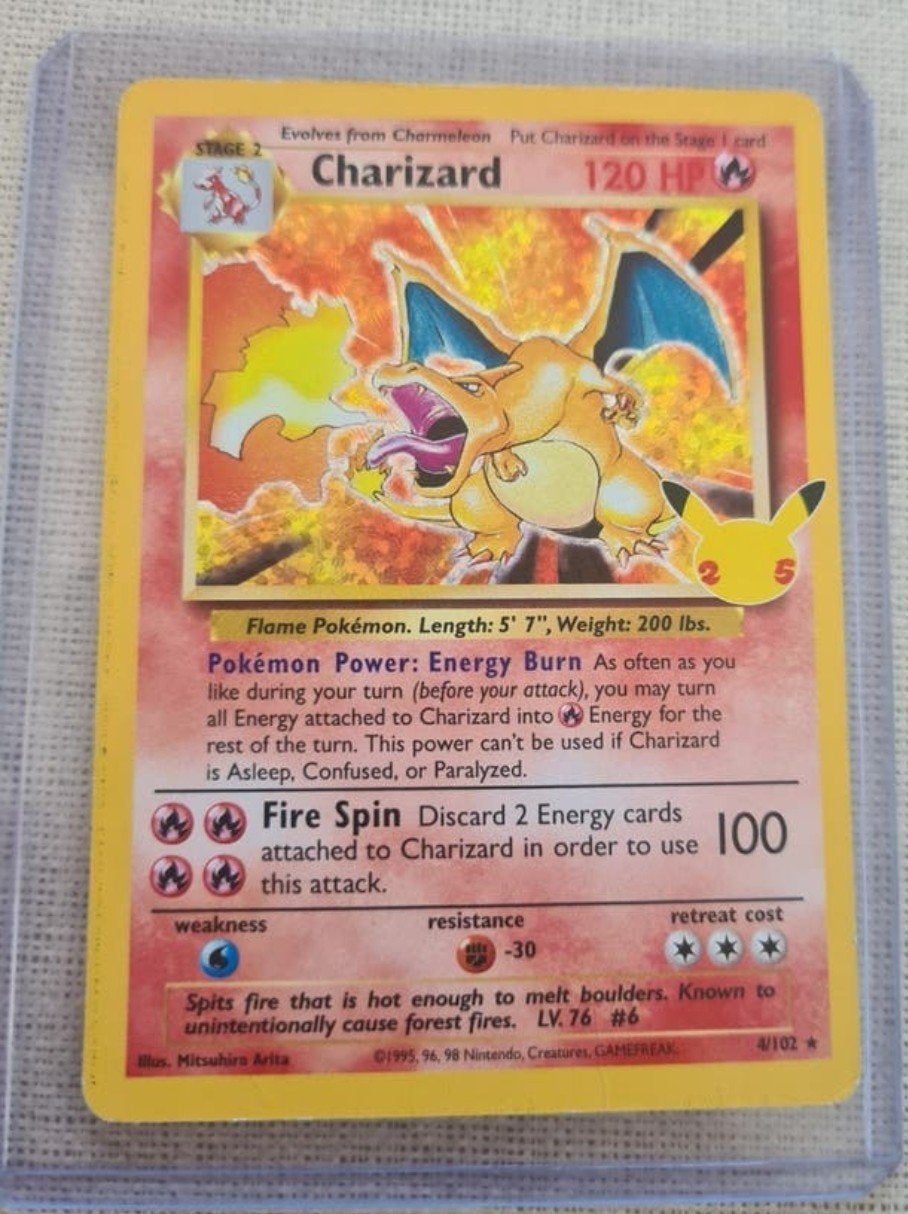 Charizard 4/102 25th Anniversary, Ophalen of Verzenden, Gebruikt, Losse kaart