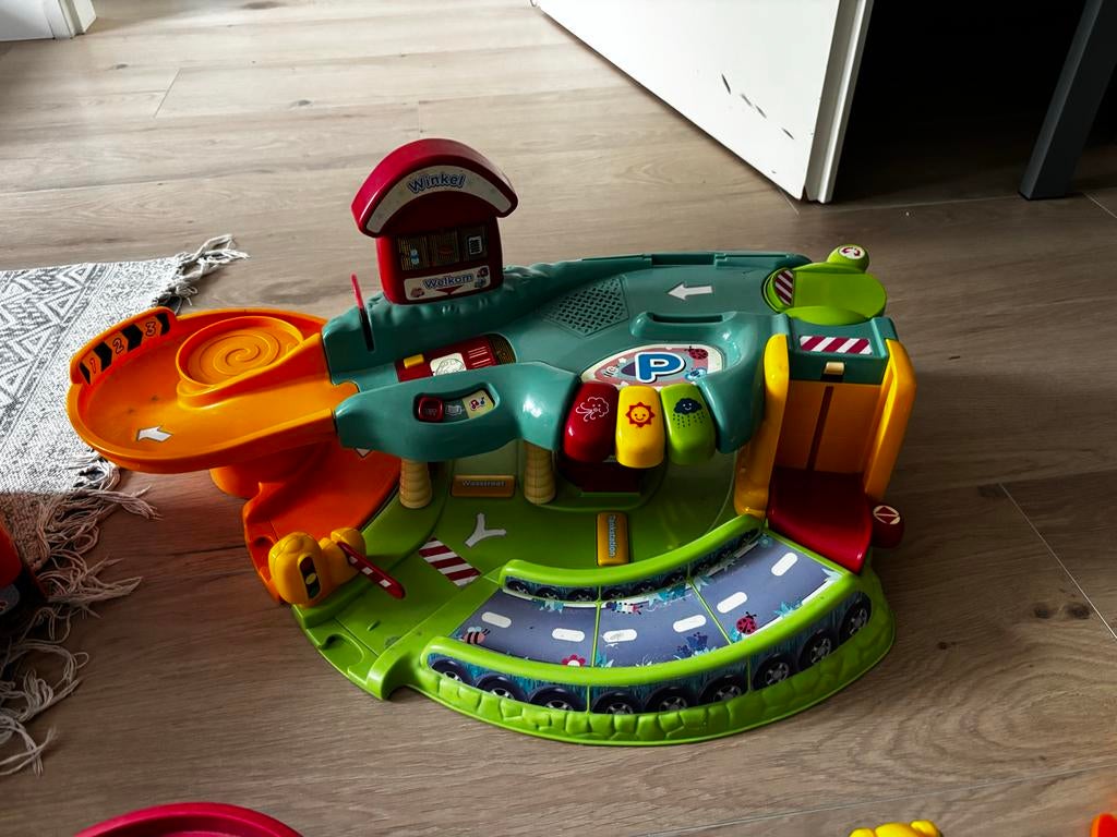 Grote verzameling VTech Toet Toet met garage en stuntbaan, Ophalen, Gebruikt, 6 maanden tot 2 jaar