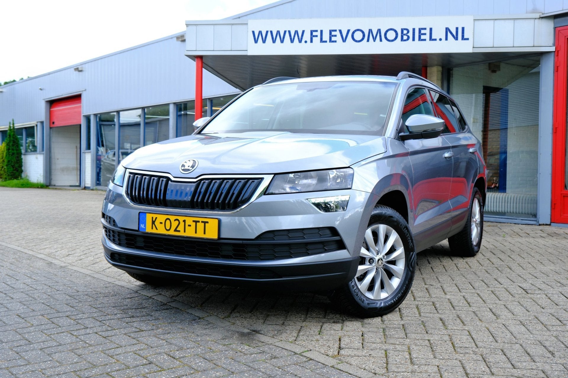 Skoda Karoq 1.0 TSI Business Edition Navi|Adapt.Cruise|1e Ei, Voorwielaandrijving, Stof, Gebruikt, Euro 6