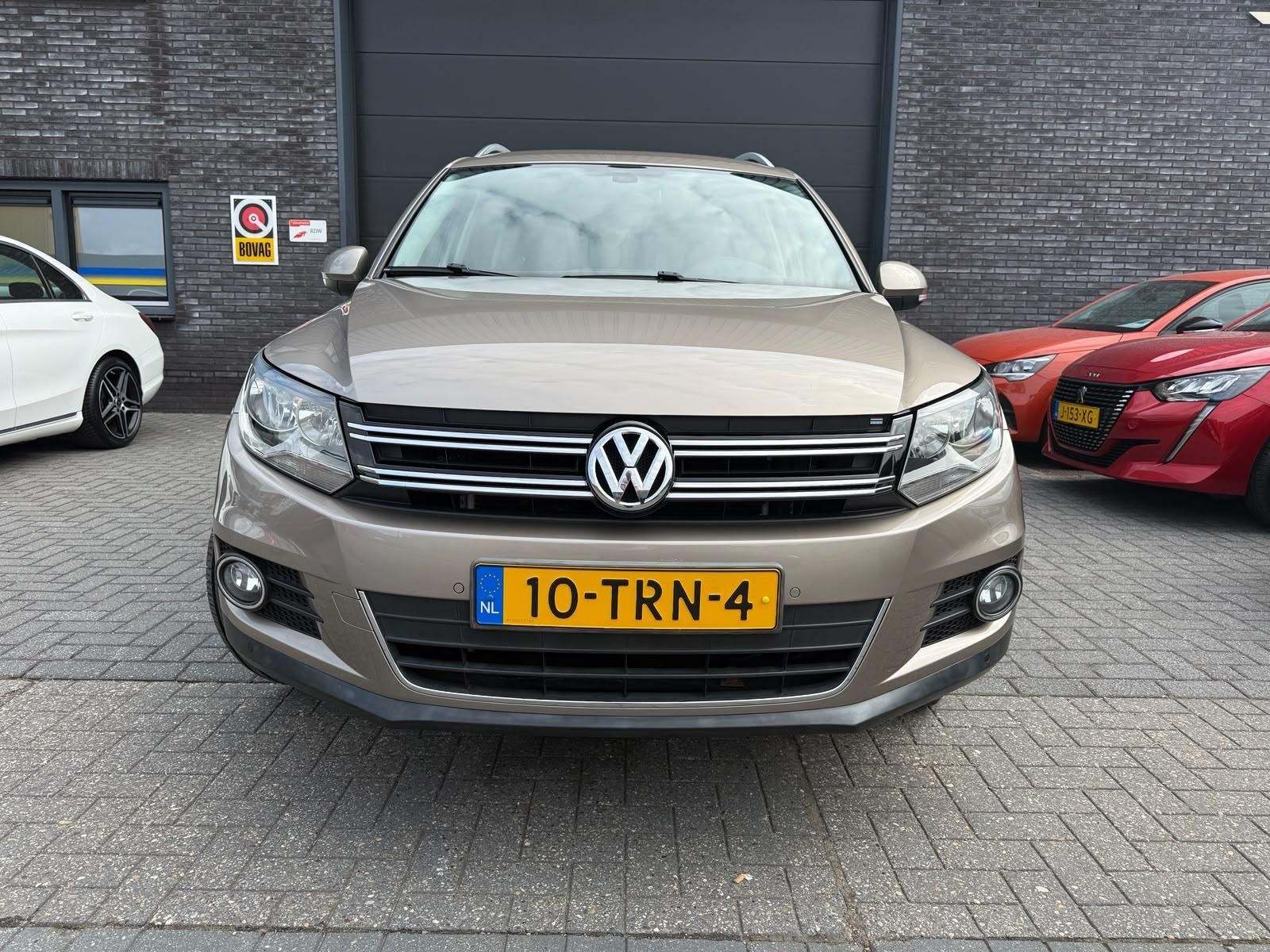 Volkswagen Tiguan 1.4 TSI Sport&Style | 1E EIGENAAR | 3/6/12, Auto's, Voorwielaandrijving, Euro 5, 15 km/l, 4 cilinders