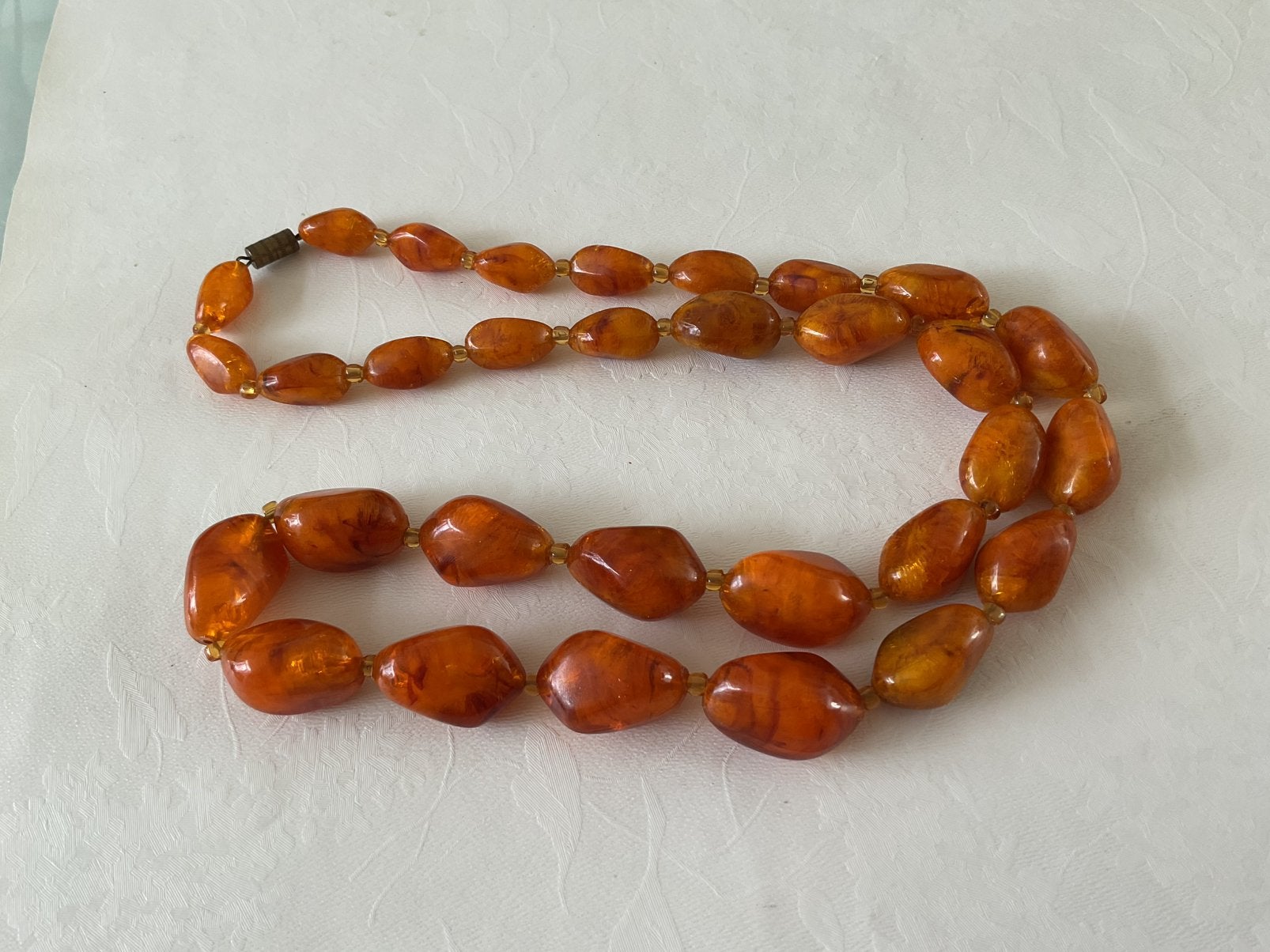 Amber ketting kralen lengte 70cm, Ophalen, Zo goed als nieuw, Steen of Mineraal