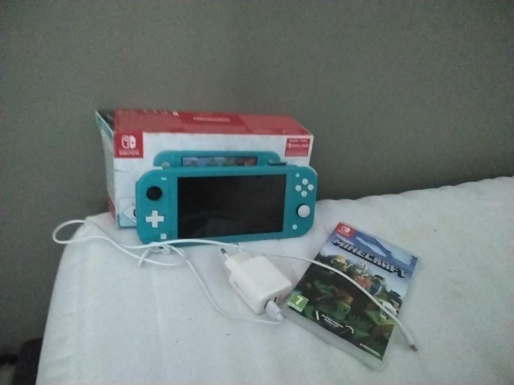 Nintendo Switch Lite Turquoise met Minecraft en doos, Met games, Ophalen of Verzenden, Zo goed als nieuw, Switch Original