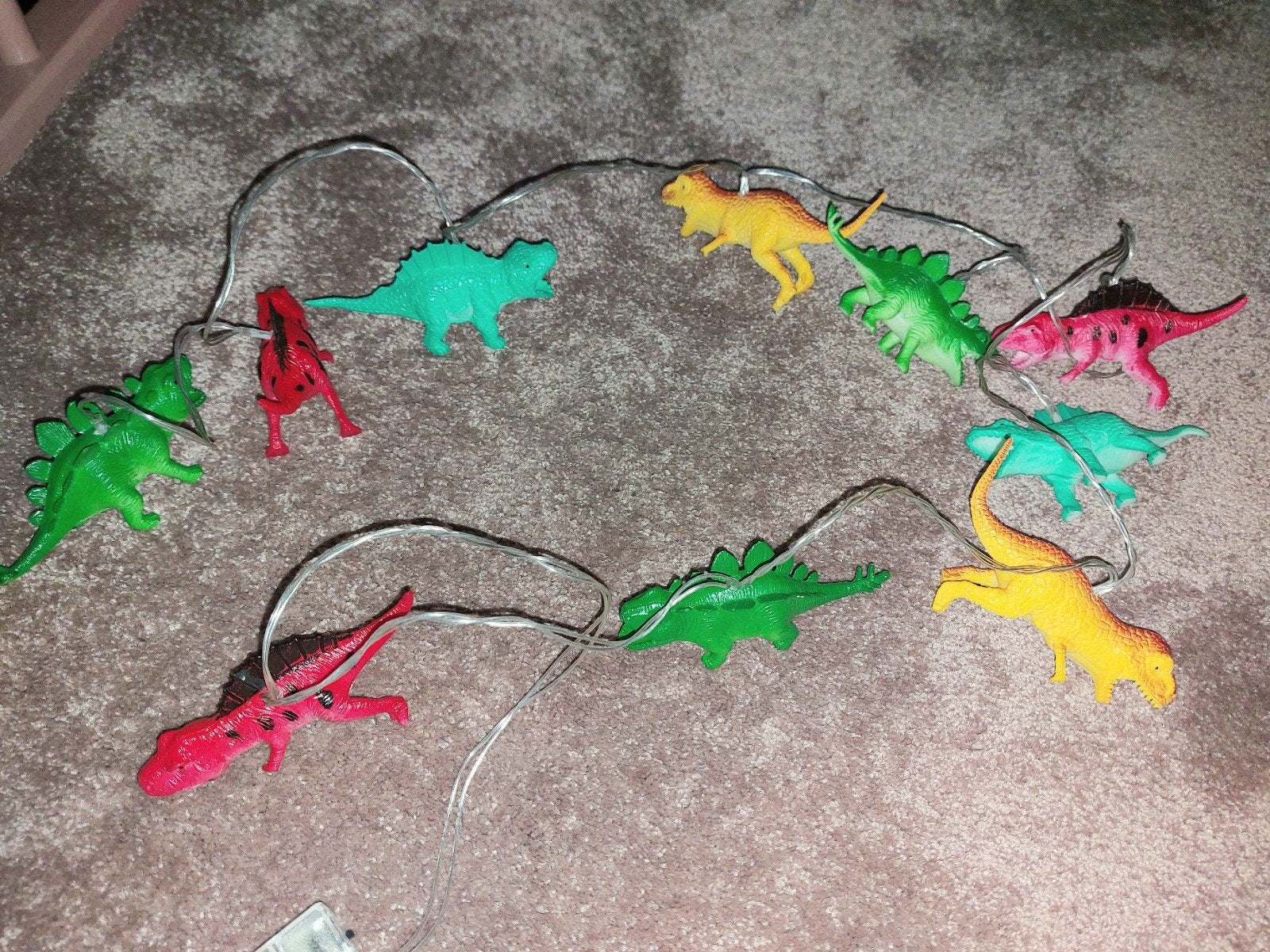 Dinosaurus slinger met lichtjes, Ophalen of Verzenden, Zo goed als nieuw