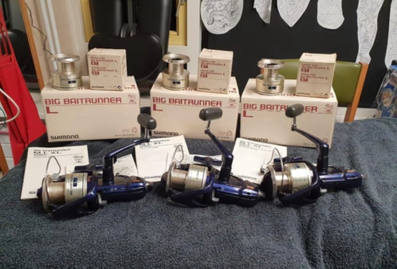 Te koop 3x shimano big l molens met reserve spoelen, Ophalen of Verzenden, Zo goed als nieuw, Molen
