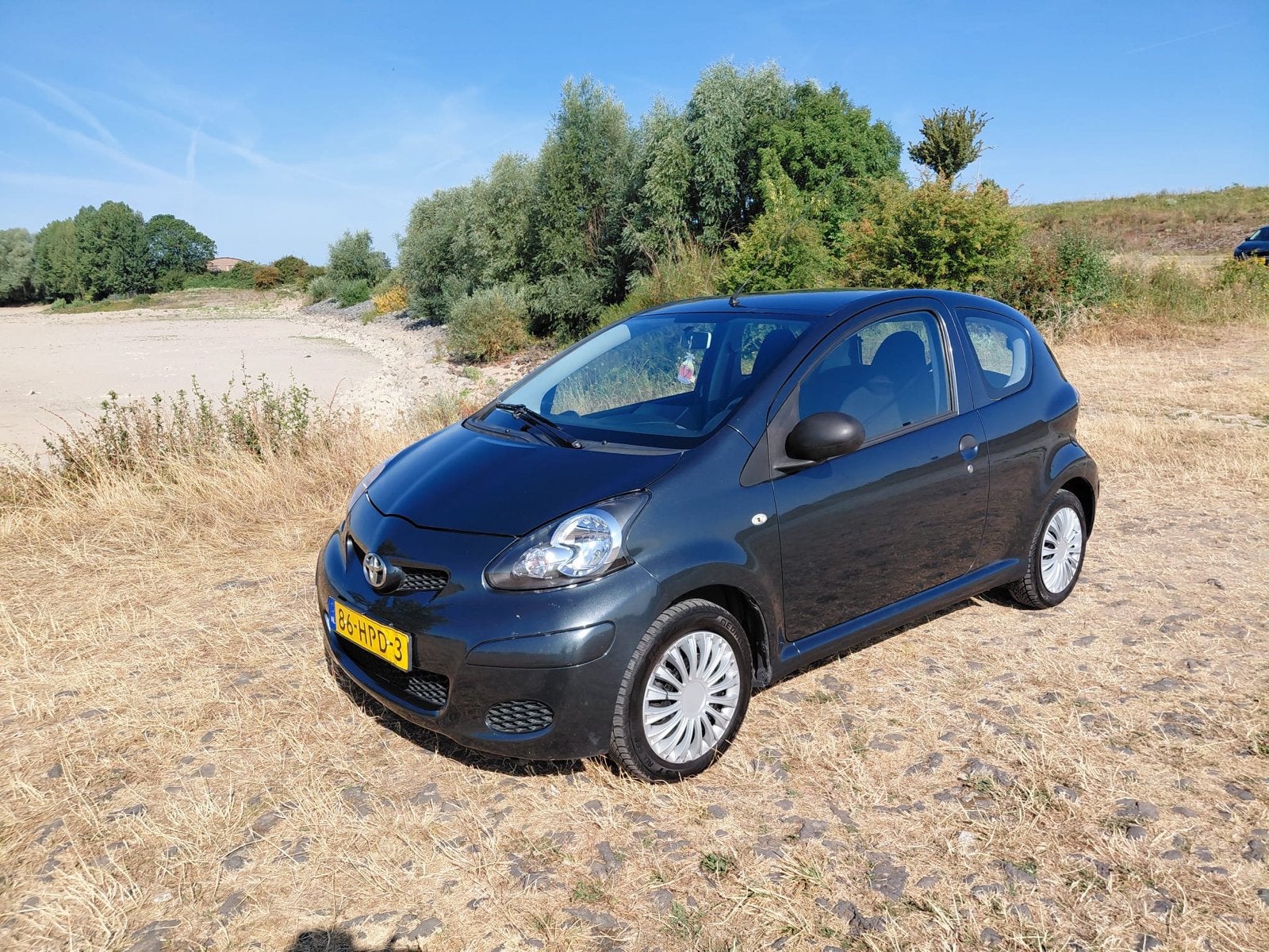 Toyota Aygo 1.0 12V Vvt-i 3DRS MMT 2009 Grijs, Auto's, Voorwielaandrijving, 4 stoelen, 68 pk, Origineel Nederlands