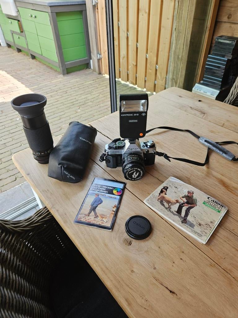 Canon AE-1 Program met flitser en extra lens, Audio, Tv en Foto, Fotocamera's Analoog, Ophalen of Verzenden, Gebruikt, Spiegelreflex