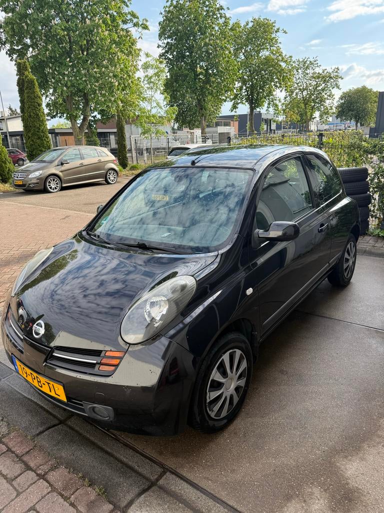 Nissan Micra 1.2 59KW 3DR 2004 Zwart NIEUWE KOPPELING & APK!, Voorwielaandrijving, 31 €/maand, 4 cilinders, Overige bekleding