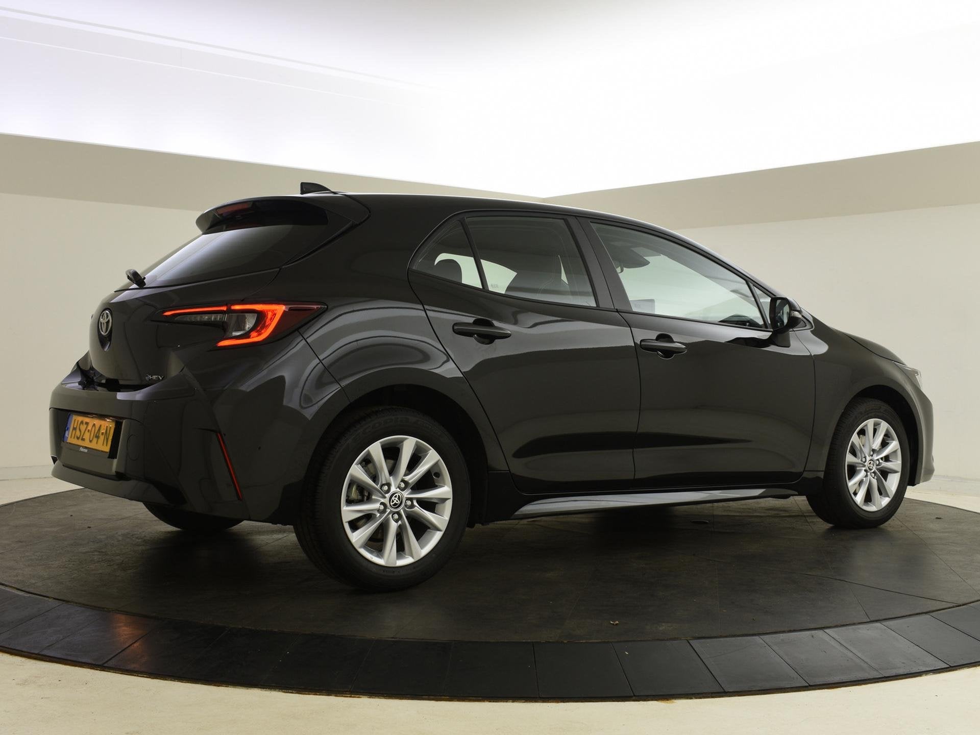 Toyota Corolla Hybrid 140 Active | groot digitaal display |, Auto's, 12 maanden, Gebruikt, 4 cilinders, Corolla