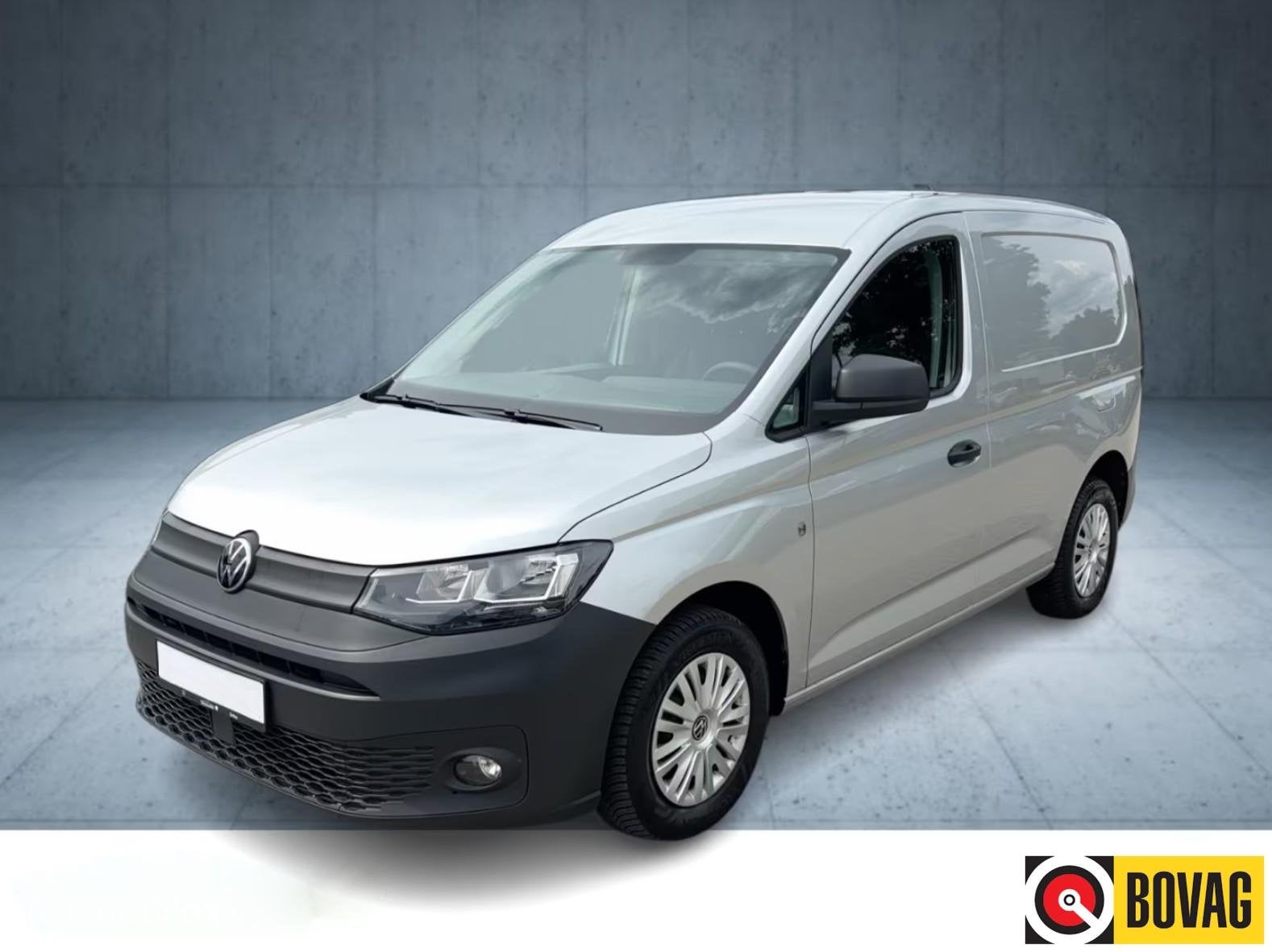 Volkswagen Caddy Cargo 2.0 TDI Comfort I 102 pk I Camera I, Auto's, Gebruikt, Zwart, 4 cilinders, Met garantie (alle)