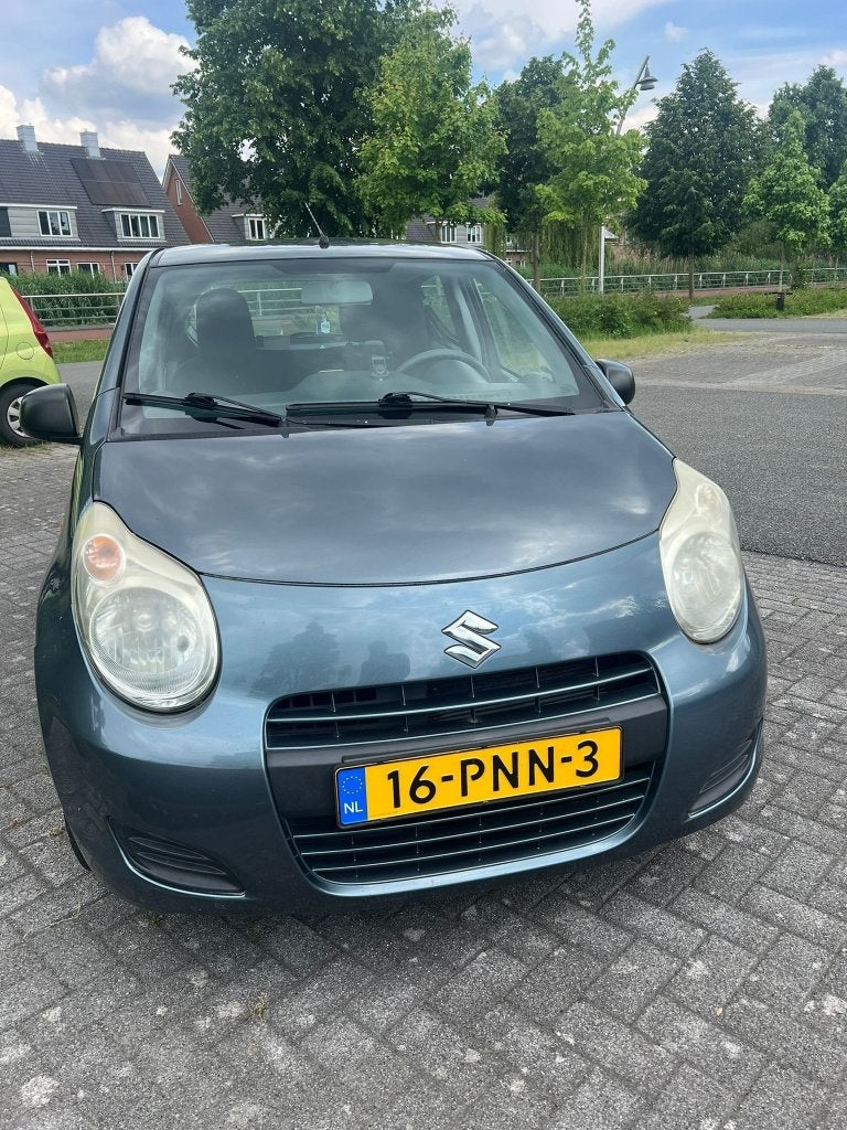 Suzuki Alto 1.0 2011 Grijs, Auto's, Voorwielaandrijving, Euro 5, Stof, 4 stoelen