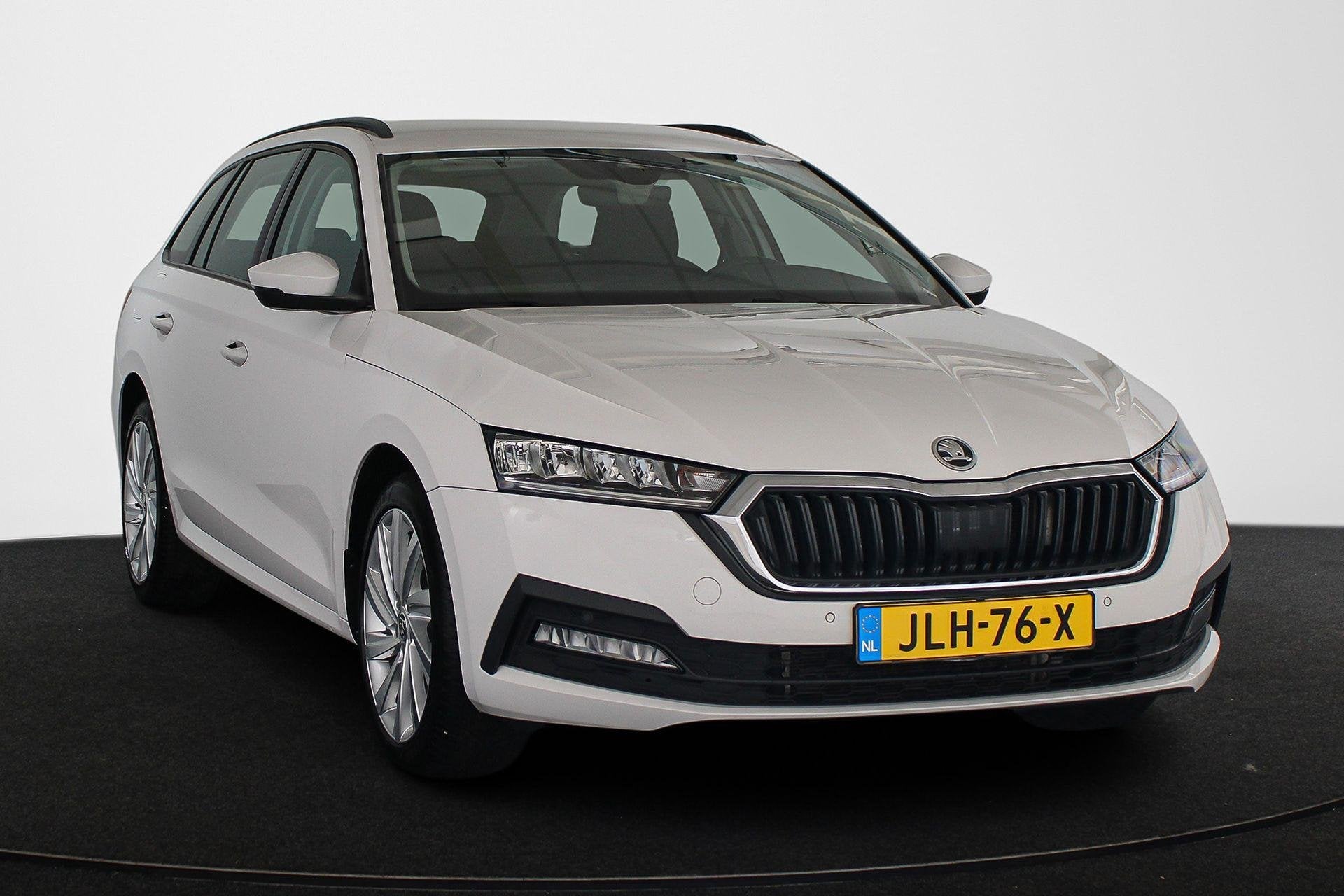 Skoda Octavia Combi 1.4 TSI iV PHEV Business Edition SOH 97%, Auto's, Skoda, Stof, Gebruikt, Wit, Plug-in hybride