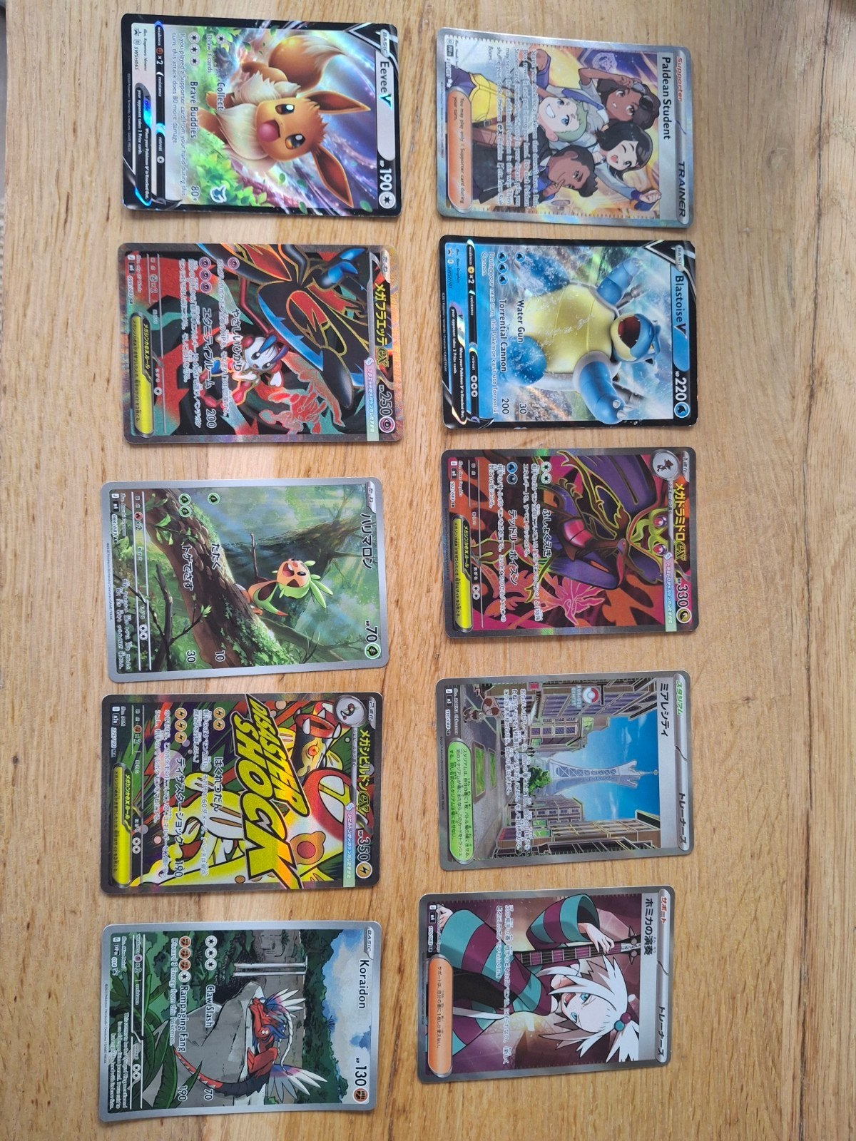 10 Pokémon kaarten - Japans & Engels - NM staat, Ophalen of Verzenden, Zo goed als nieuw, Meerdere kaarten