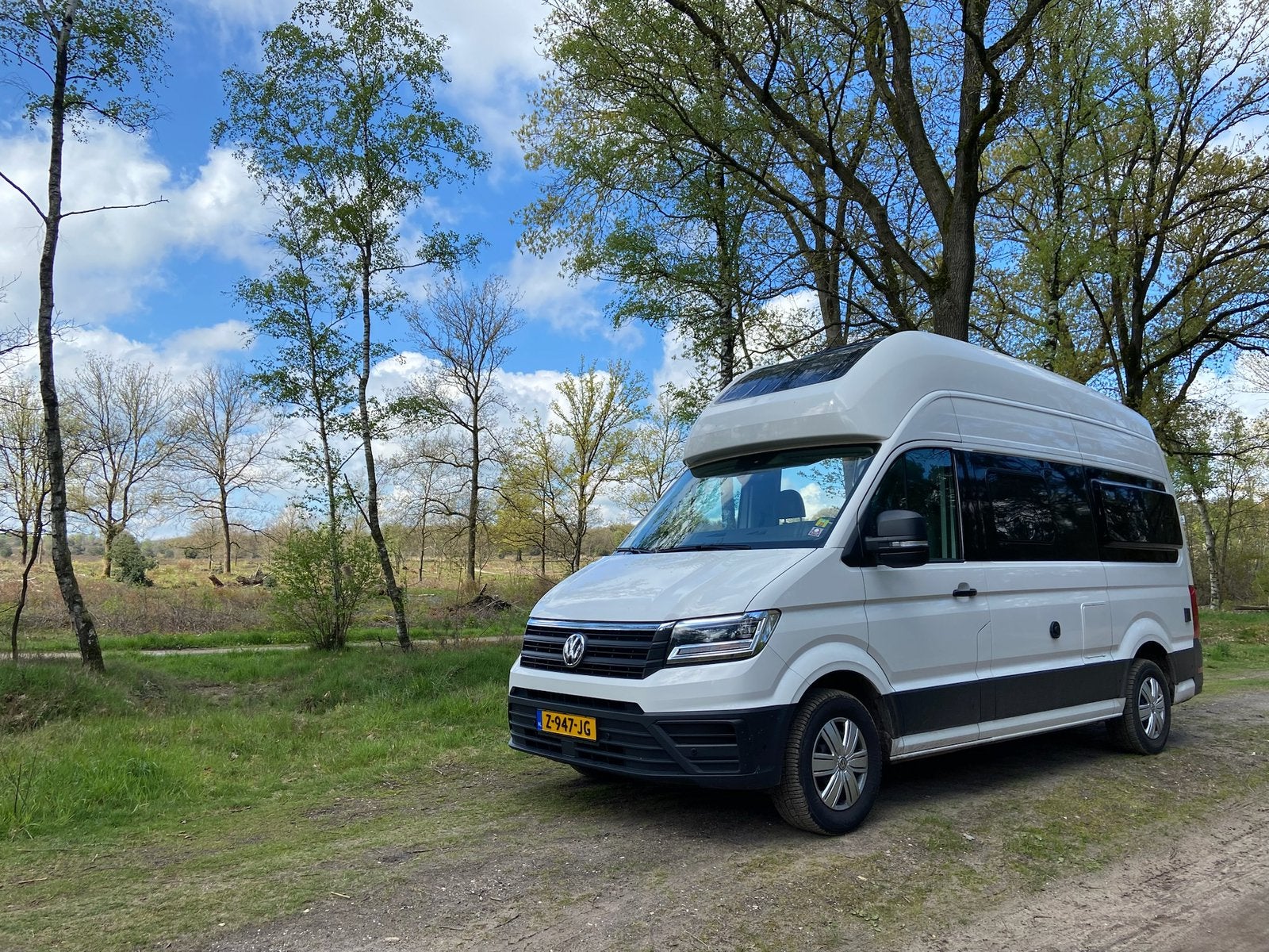 Volkswagen Grand California 600 automaat (2022) - 4 persoons, Caravans en Kamperen, Automaat, Buscamper of Camperbus, Ringverwarming