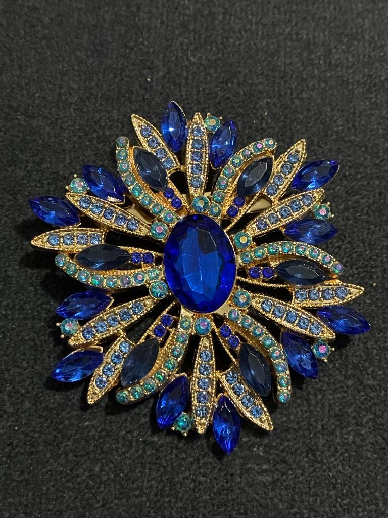 Gouden broche met blauwe stenen, Met kristal, Overige materialen, 4 tot 7 cm, Gebruikt