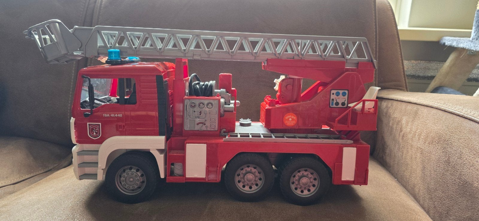 Vrachtwagen MAN met brandladder en sirene - Bruder, Ophalen of Verzenden, Zo goed als nieuw