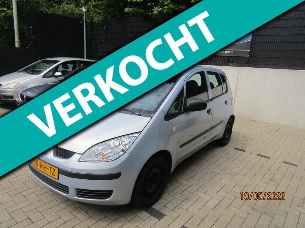 Mitsubishi Colt 1.3 Invite +Airco - 5 Deurs, Gebruikt, 31 €/maand, Blauw, Colt
