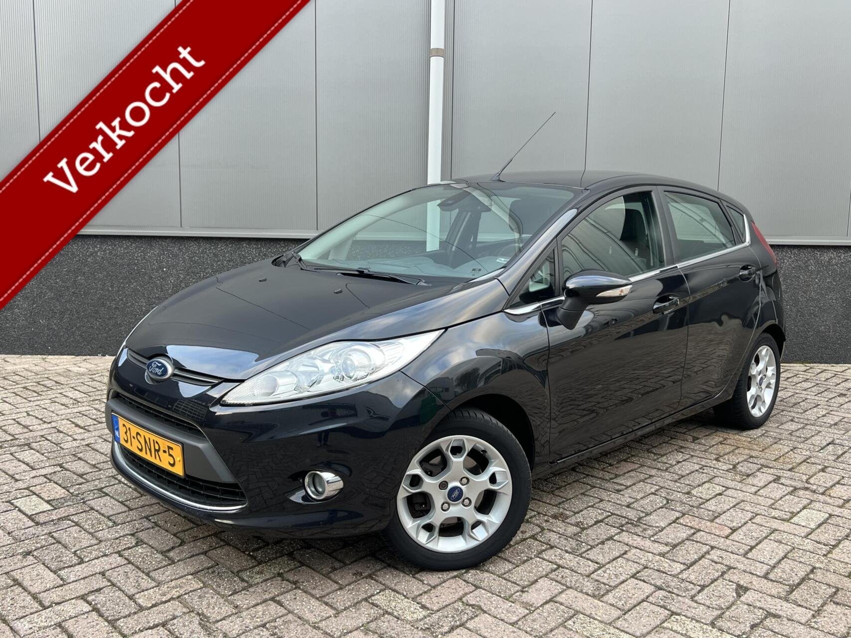 Ford Fiesta 1.25 Titanium Cruise Climate Parksensor NAP, Voorwielaandrijving, Euro 5, 1242 cc, 82 pk