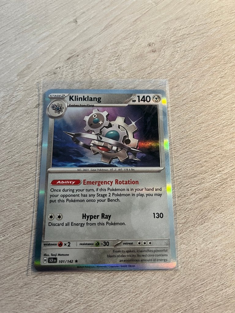 Klinklang (Holo) 101/142 Stellar Crown - Pokémon Kaart, Ophalen of Verzenden, Nieuw, Losse kaart, Foil