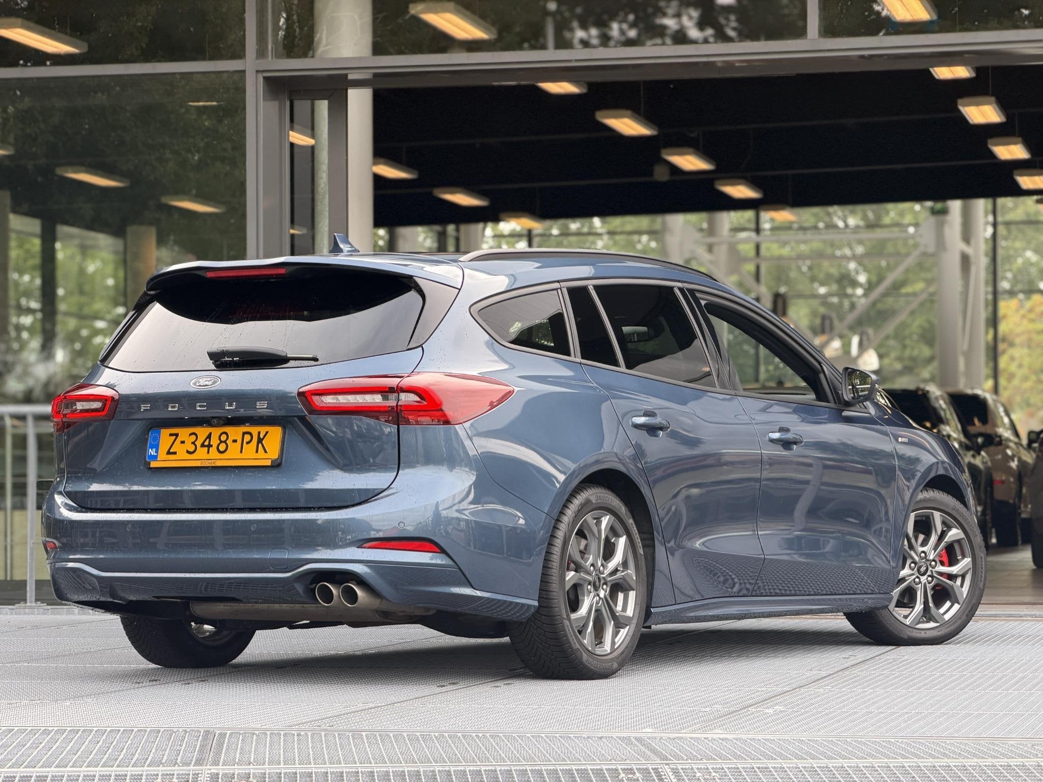 Ford Focus Wagon 1.0 EcoBoost Hybrid ST Line X Automaat 155P, Auto's, Stof, Gebruikt, Euro 6, Blauw
