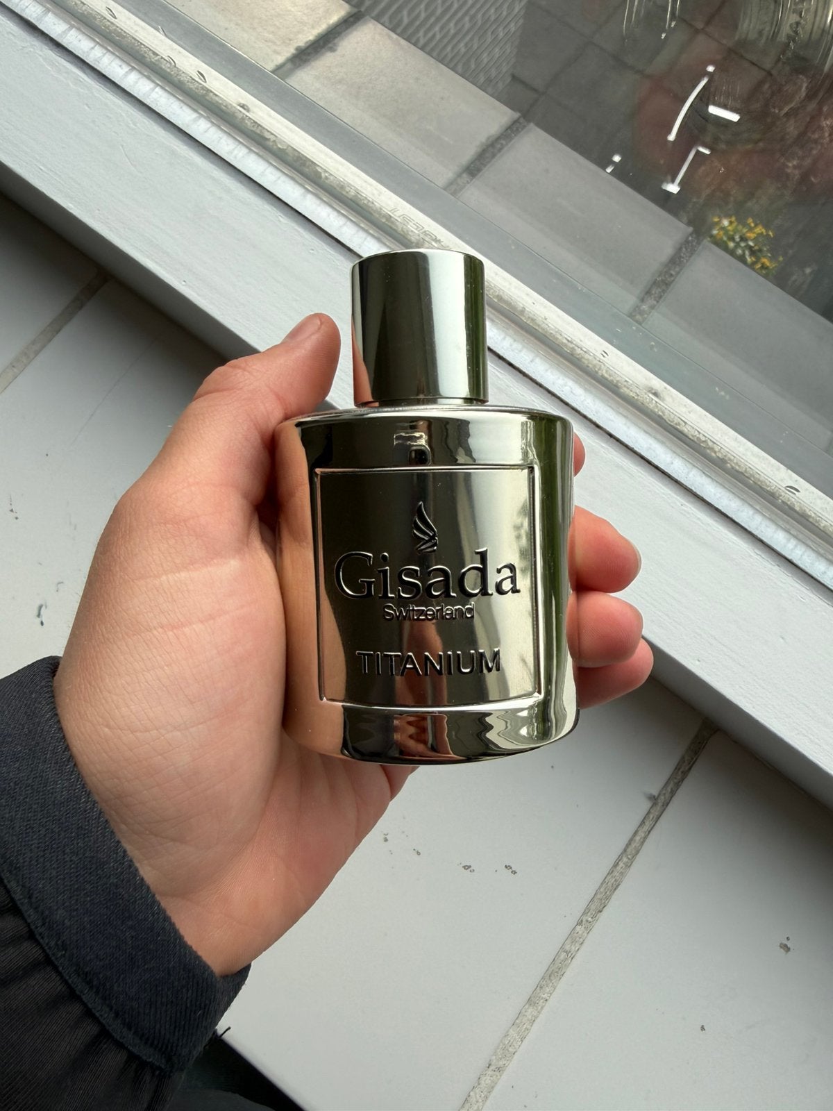 Gisada titanium, Ophalen of Verzenden, Zo goed als nieuw, Parfumfles