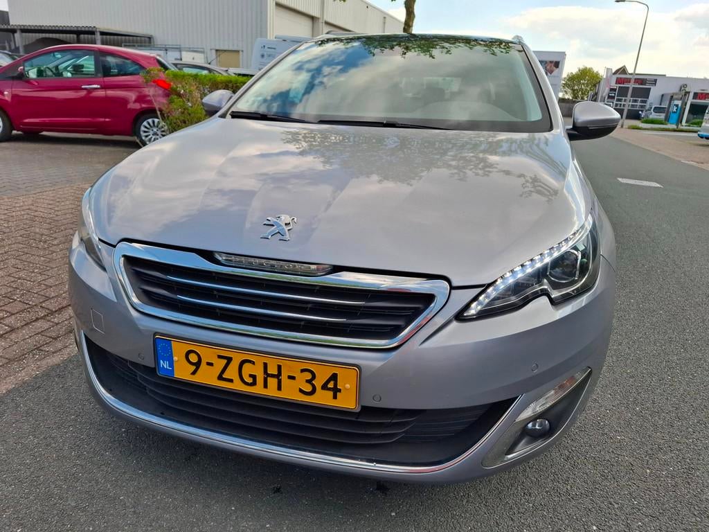 Peugeot 308 SW 1.2 e-THP Première PANO/CLIMA/CRUISE/NAVI!, Voorwielaandrijving, Gebruikt, 1199 cc, 1165 kg