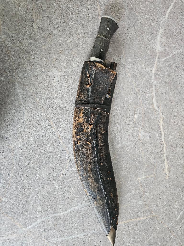 antiek nepalees mes, Ophalen