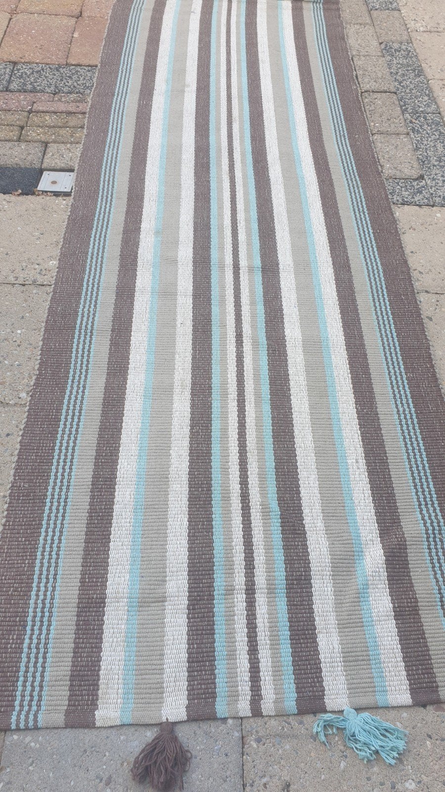 Karpet tapijs, Ophalen