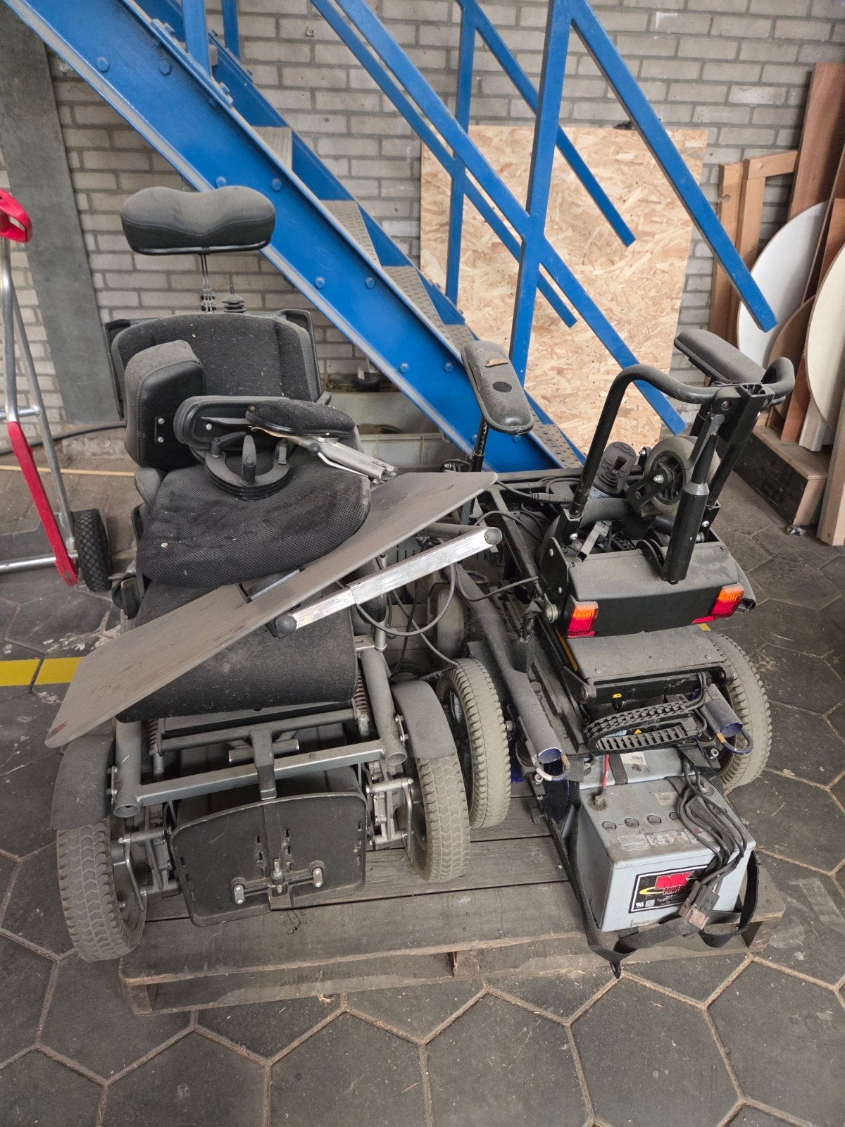 knutsel elektrische rolstoelen, Ophalen