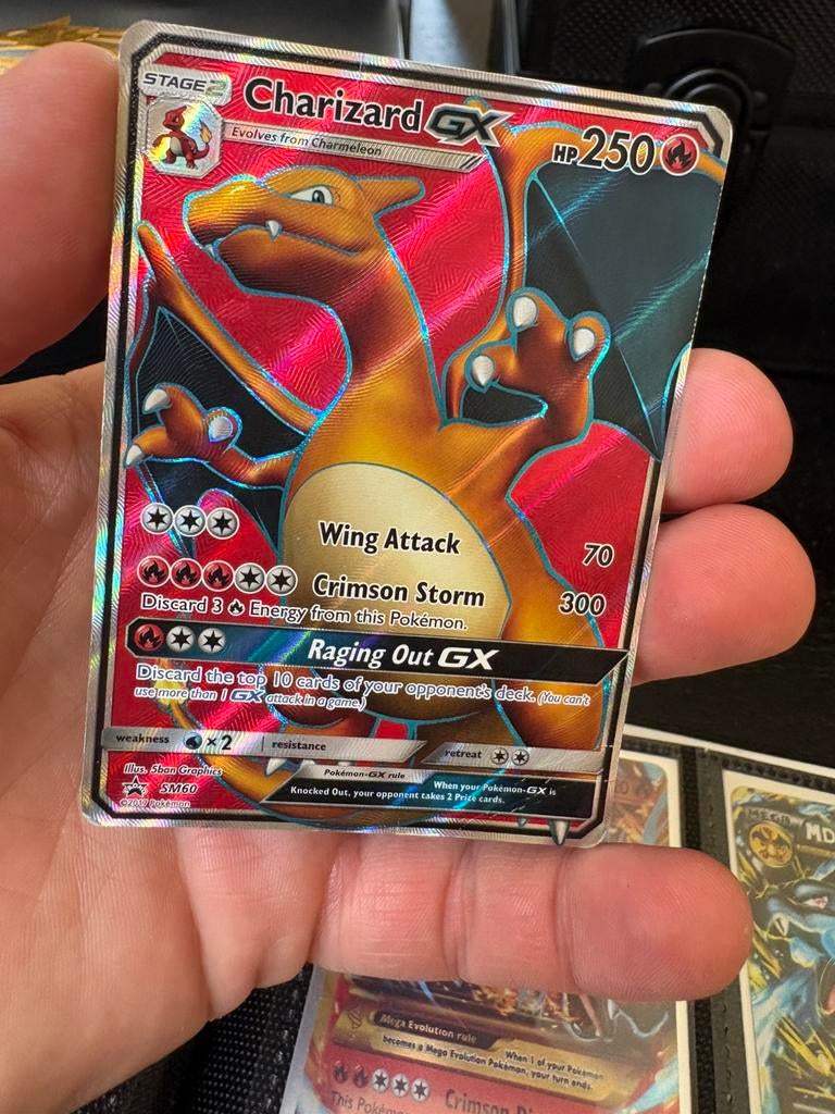Charizard gx, Ophalen of Verzenden, Zo goed als nieuw, Meerdere kaarten, Foil