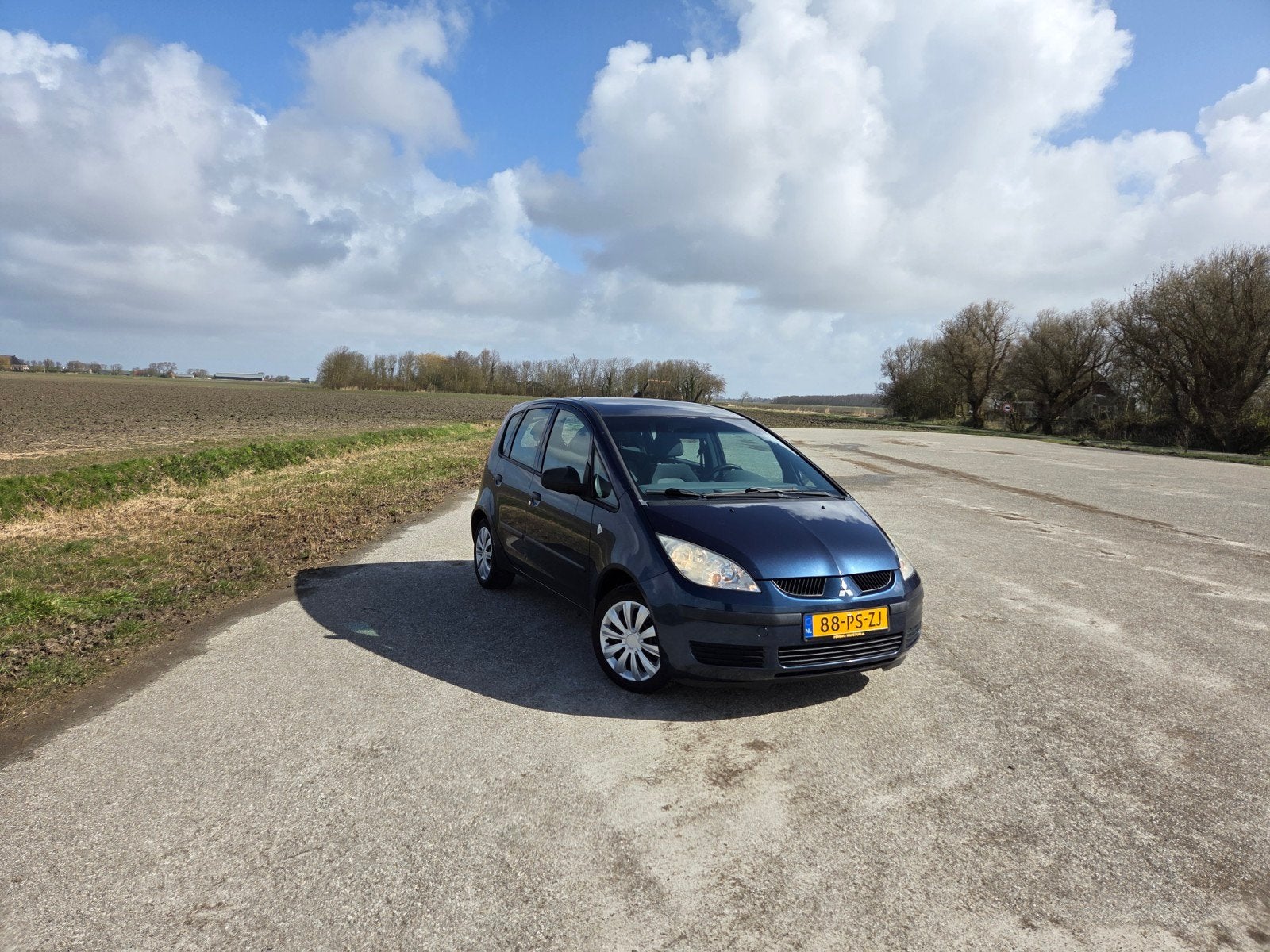 Mitsubishi Colt 1.3 CZ5 2004 Blauw Airco, Auto's, Stof, 31 €/maand, Blauw, Colt