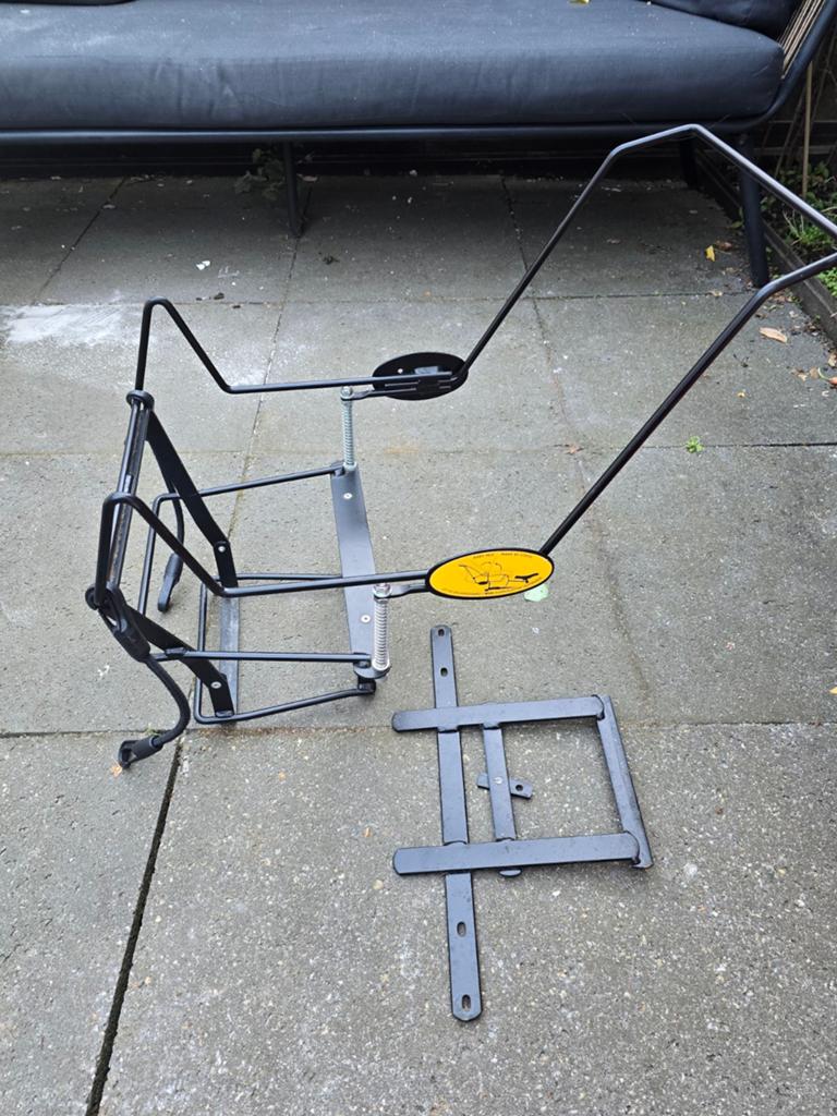Maxicosi bakfiets houder, Ophalen