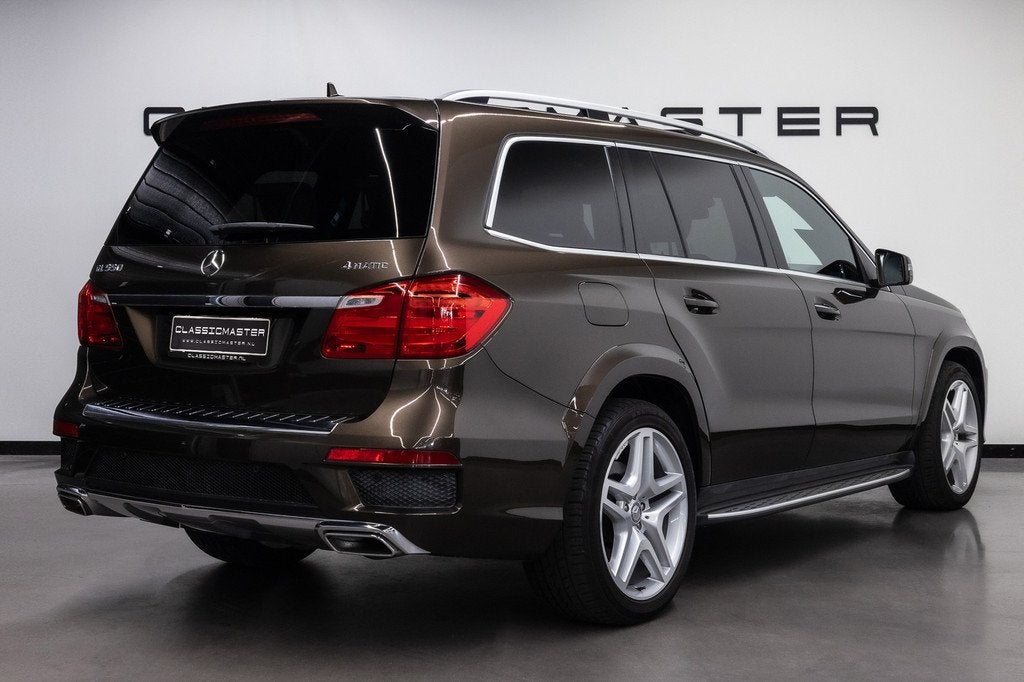 Mercedes-Benz GL-Klasse 500 4-Matic BTW auto, AMG Exclusive, Auto's, Mercedes-Benz, 8 cilinders, Bruin, 7 stoelen, Bedrijf
