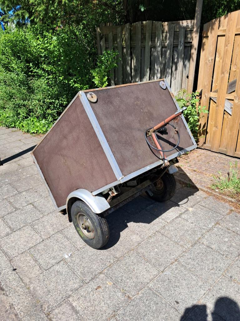 Aanhangwagen voor achter scooter, Ophalen