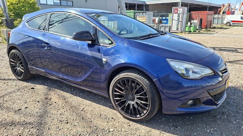 Opel Astra 1.4 T 140PK S&S 2013 Blauw, Auto's, Opel, Voorwielaandrijving, 1350 kg, Stof, Zwart
