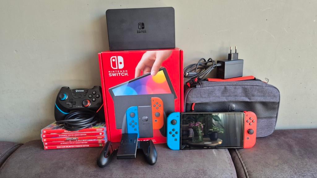 Nintendo Switch OLED met games en extra controller, Switch OLED, Met games, Ophalen of Verzenden, Zo goed als nieuw