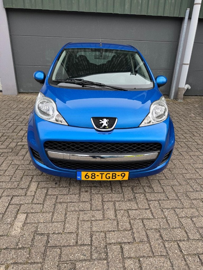 Peugeot 107 1.0 12V 5DR 2012 Blauw, Auto's, Voorwielaandrijving, Stof, Zwart, 68 pk