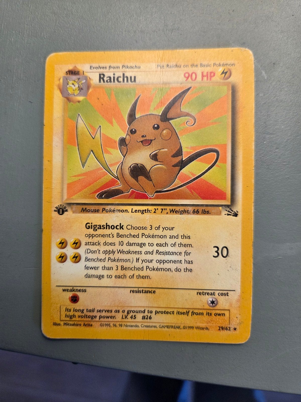 Pokémon Kaart Raichu 29/62 (Licht Beschadigd) 1e editie, Hobby en Vrije tijd, Ophalen of Verzenden, Gebruikt, Losse kaart